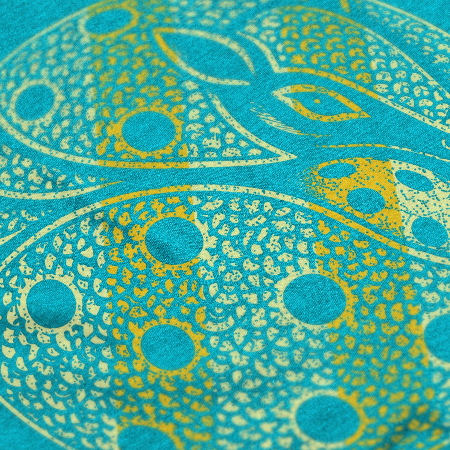 Close-up of Armor pickleball shirt in Bondi – armadillo graphic detail on back