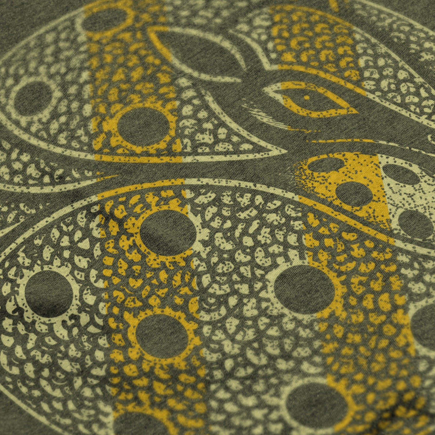 Close-up of Armor pickleball shirt in military – armadillo graphic detail on back