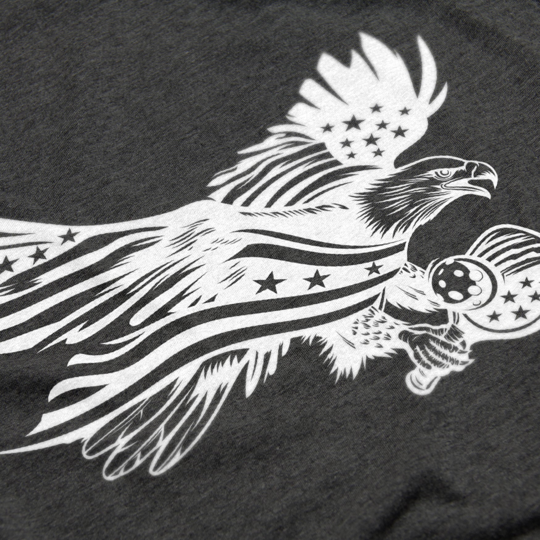Close-up of Soar pickleball shirt in charcoal – patriotic eagle flag graphic detail on chest