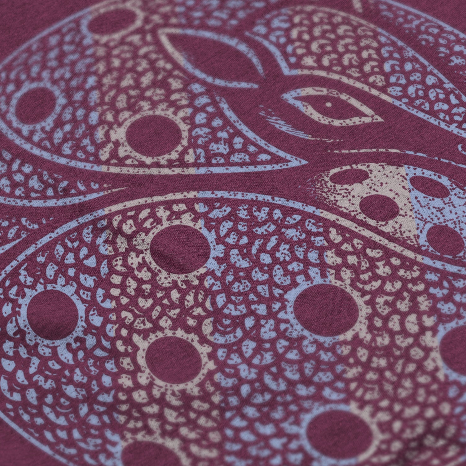 Close-up of Armor pickleball shirt in lush – armadillo graphic detail on back